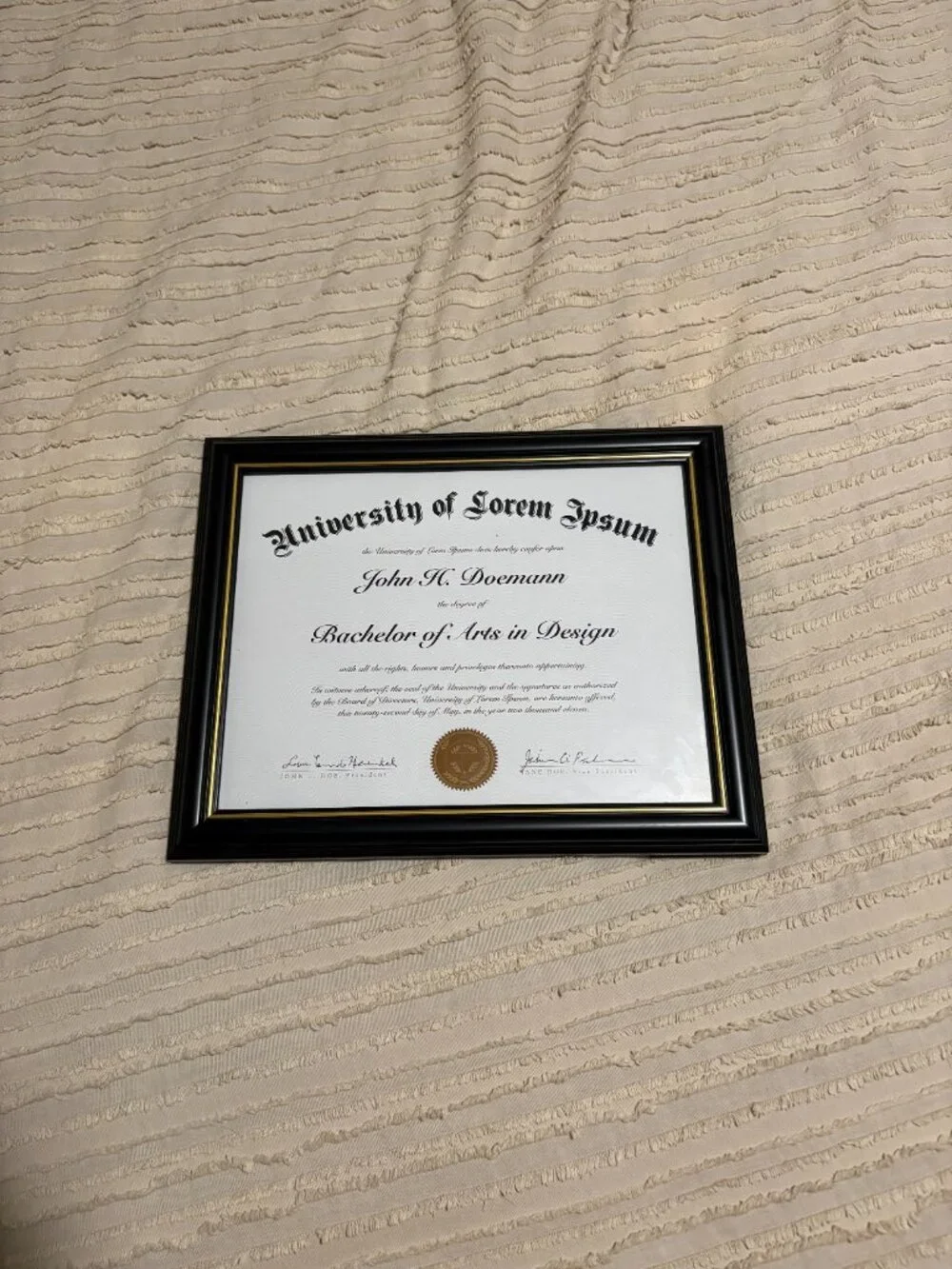 Black and gold diploma frame